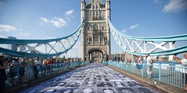 French artist, JR, led the Inside Out Project. Image depicts the installation on London's Tower Bridge in June 2021.