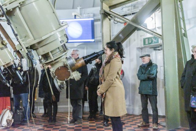 Event; A Valentines Evening Under the Stars at the Royal Observatory Greenwich: astronomers and guests enjoy looking at the moon and stars through the great equatorial telescope under the onion dome; and through telecopes in the astronomy garden besides Fl