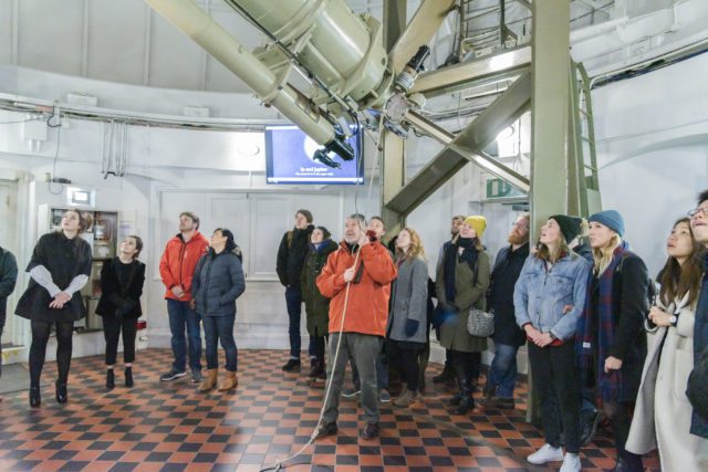 Event; A Valentines Evening Under the Stars at the Royal Observatory Greenwich: astronomers and guests enjoy looking at the moon and stars through the great equatorial telescope under the onion dome; and through telecopes in the astronomy garden besides F