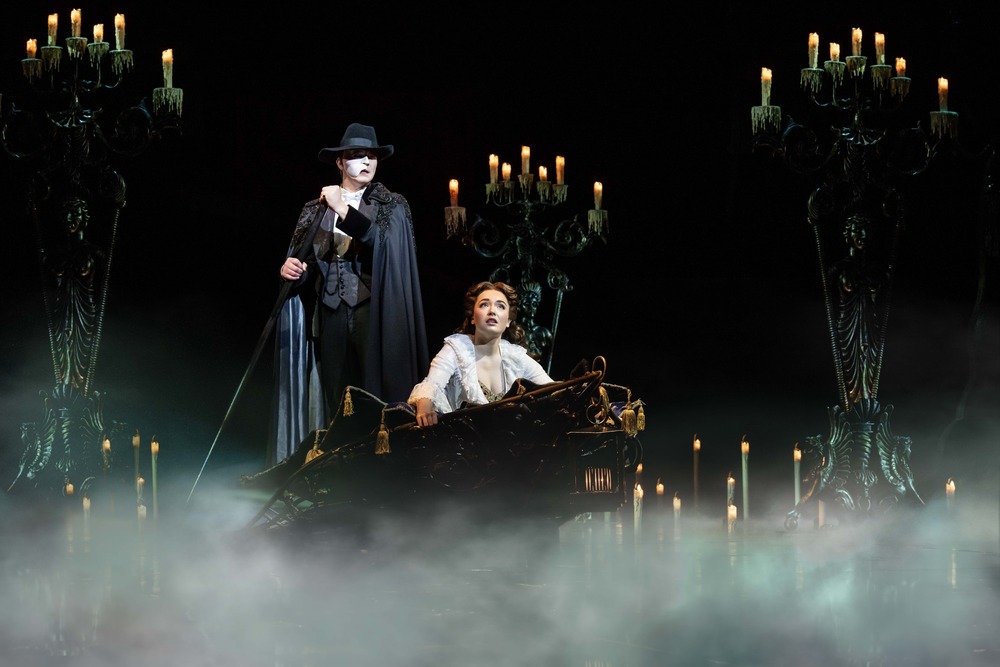 Dean Chisnall as The Phantom and Lily Kerhoas as Christine. Photo by Johan-Persson